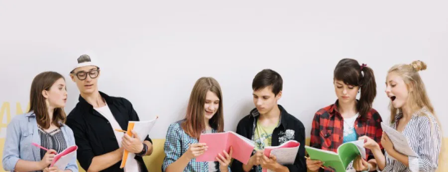 Program Student Achivement Test (SAT) 1 children_learning_with_books_at_wall_23_2147666884